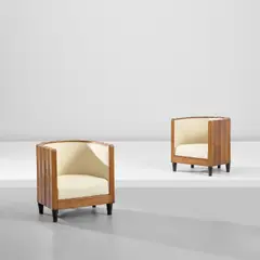 Unique pair of armchairs by Osvaldo Borsani, circa 1928, Walnut-veneered wood, stained wood, fabric, sold Apr 2025