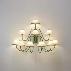 Jean Royere, Ten-armed 'Bouquet' wall light, circa 1950, Painted metal, paper shades