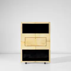 Drop-front cabinet by Guglielmo Ulrich, late 1930s, Parchment-covered wood, ebonised wood, ebonised veneered wood, birch-veneered wood, sold Apr 2025