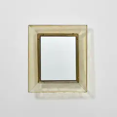Mirror, model no. 30 by Carlo Scarpa, circa 1937, Pagliesco glass, mirrored glass, brass, sold Apr 2025
