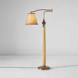 Guglielmo Ulrich, Adjustable floor lamp, late 1930s, Parchment-covered wood, copper-plated brass, brass, palm wood, Macassar ebony, paper, leather, cotton thread, raffia