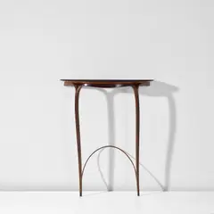 Wall-mounted console by Carlo Enrico Rava, circa 1948, East Indian rosewood, East Indian rosewood-veneered wood, sold Apr 2025