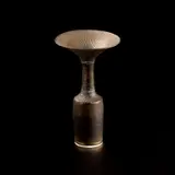 Vase with flaring lip by Lucie Rie, 1988, Porcelain, golden manganese glaze with radiating sgraffito to shoulder and lip, sold Apr 2025