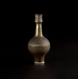 Vase by Lucie Rie, 1988, Porcelain, golden manganese glaze with sgraffito, sold Apr 2025