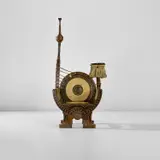 Carlo Bugatti, 'Curule' armchair, circa 1902, Walnut, stained walnut with brass and pewter inlay, parchment, brass, passementerie
