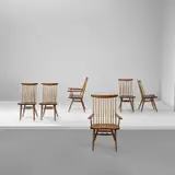 Set of four 'New' chairs and two 'New' armchairs by George Nakashima, designed 1955, produced 1965, Walnut, hickory, sold Apr 2025