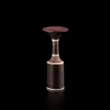 Vase with flaring lip by Lucie Rie, circa 1974, Porcelain, manganese glaze, terracotta bands with radiating sgraffito and three inlaid blue lines to shoulder and neck, sold Apr 2025