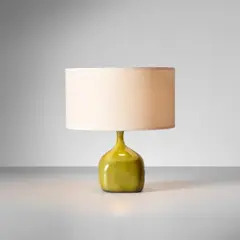 Table lamp by Jacques & Dani Ruelland, circa 1960, Glazed earthenware, fabric shade, sold Apr 2025