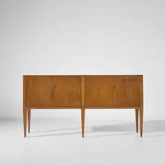 Sideboard by Gio Ponti, circa 1941, Walnut, walnut-veneered wood, brass, sold Apr 2025