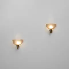 Pair of wall lights, model no. 442 by Carlo Scarpa, circa 1936, Iridescent coloured corroso glass, brass, sold Apr 2025