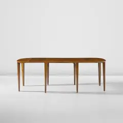 Extendable dining table by Gio Ponti, circa 1941, Walnut, walnut-veneered wood, sold Apr 2025