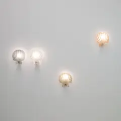 Set of four wall lights by Seguso, 1940s, Iridescent coloured corroso glass, brass, sold Nov 2025