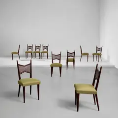 Jean Royere, Set of ten dining chairs, circa 1955, Stained oak, cane, fabric