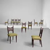 Jean Royere, Set of ten dining chairs, circa 1955, Stained oak, cane, fabric
