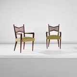 Jean Royere, Pair of carver chairs, circa 1955, Stained oak, cane, fabric