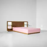 Jean Royere, Bed with integrated bedside tables, circa 1955, Oak, stained oak-veneered wood, fabric, glass, mirrored glass