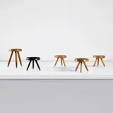 Five 'Berger' stools by Charlotte Perriand, circa 1953 and circa 1960, From left to right: Sapele mahogany, ebonised cedar, ash, teak, elm, sold Nov 2025