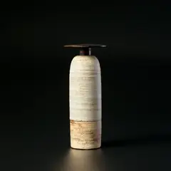 Hans Coper, Bottle with disc top, circa 1967, Stoneware, layered porcelain slips and engobes over a textured and incised body, the disc top and interior with a manganese glaze