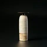 Hans Coper, Bottle with disc top, circa 1967, Stoneware, layered porcelain slips and engobes over a textured and incised body, the disc top and interior with a manganese glaze