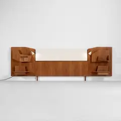 Gio Ponti, Headboard with integrated bedside tables and lights, circa 1955, Vinhatico-veneered wood, walnut, fabric, painted aluminium, brass