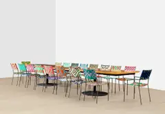 Franz West, Nineteen Works: (i) Dining Table ; (ii-xix) Onkel-Stuhl (Uncle Chair), 2006, (i) wood and resin on steel (ii-xix) fabric on steel