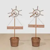 Martin Kippenberger, Entry to Lord Jim Lodge, 1989, bronze, copper pipe, metal, chipboard, plastic and copper paint, in 2 parts
