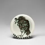 Oiseau au ver (Bird with Worm) (A.R. 172) by Pablo Picasso, 1952, White earthenware round ashtray painted in black with partial brushed glaze, sold Jun 2024