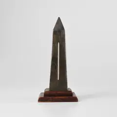 Proverb by Man Ray, 1973, Bronze multiple with silver rod, mounted on wooden base, sold Sep 2024