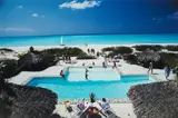 Slim Aarons, Swimming Pool on the Beach, 1980, Chromogenic print, printed later, mounted