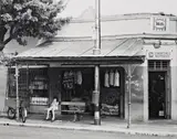 David Goldblatt, Street traders and the colonnade of the Walter Sisulu Square of Dedication, Kliptown, Soweto