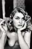 Young Berlin Girl Smoking Cigarette by Helmut Newton, 1977, Gelatin silver print, printed early 1990s, sold May 2024