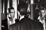 Karl Lagerfeld at Chanel and Mirrors, Paris by Helmut Newton, 1983, Gelatin silver print, printed early 1990s, sold May 2024