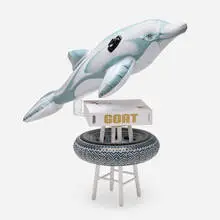 Jeff Koons, GOAT: A Tribute to Muhammad Ali - Champ's Edition, 2004, bound printed paper, inflatable PVC, painted wood, maple, gelatin silver print