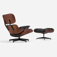 Charles and Ray Eames, 670 lounge chair and 671 ottoman, walnut, leather, enameled and brushed aluminum, rubber