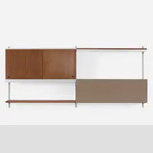 CSS (Comprehensive Shelving System) by George Nelson & Associates, 1959, walnut veneer, aluminum, fabric, lacquered Masonite, sold Sep 2025