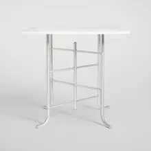Table by Warren McArthur, c. 1933, aluminum, laminate, sold Aug 2025