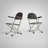 Warren McArthur, Folding armchairs model 1160-AU, pair, c. 1937, aluminum, vinyl upholstery, rubber