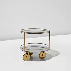 Serving trolley, model no. 2246 by Max Ingrand, circa 1962, Coloured glass, coloured mirrored glass, brass, rubber, sold May 2024