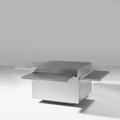 'Cubo Magico' coffee table, from the 'Plurimi series' by Gabriella Crespi, circa 1970, Stainless steel-covered wood, sold May 2024
