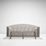 Early 'How High the Moon' two-seater sofa by Shiro Kuramata, designed 1986, produced 1987, Nickel-plated steel mesh, nickel-plated steel, sold May 2024