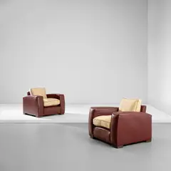 Paul Dupré-Lafon, Pair of armchairs, circa 1929, Leather, fabric, brass-covered wood