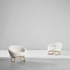 Kurt Østervig, Pair of chairs, model no. 57A, circa 1958, Sheepskin, oak