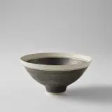 Lucie Rie, Footed bowl, circa 1965, Porcelain, manganese glaze and terracotta inlaid lines