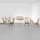 Set of eleven 'New' chairs and one 'New' armchair by George Nakashima, 1957 and 1960, American walnut, hickory, sold May 2024