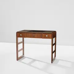 Dressing table by Paolo Buffa, circa 1935, Walnut-veneered wood, walnut, Macassar ebony-veneered wood, glass, nickel-plated brass, sold May 2024