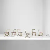 Set of six 'Sedia 73' folding chairs by Gabriella Crespi, 1973, Brass, leather, sold May 2024