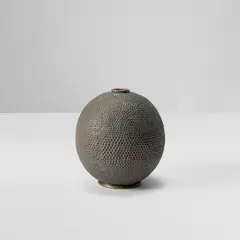 Vase by Gio Ponti, circa 1933, Patinated copper, sold May 2024