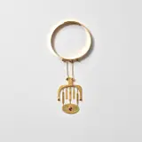 Margaretha Dubach, Necklace with detachable brooch, 1971, The 18 karat gold collar set with three cabochon pink tourmalines, supporting a detachable sculpted gold pendant brooch embellished with five cabochon pink tourmalines