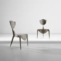 Pair of 'Paris' chairs by André Dubreuil, circa 1988, Bent, welded and torch-decorated steel, sold Nov 2024