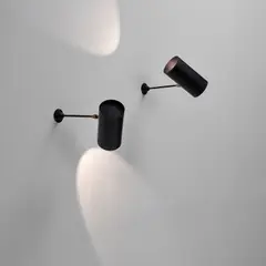 Pair of 'Tuyau' wall lights by Serge Mouille, circa 1955, Painted aluminium, painted steel, brass, sold Nov 2024